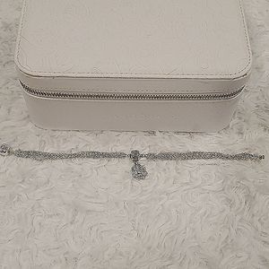 Authentic retired Pandora bracelet and charm.